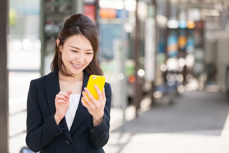 Woman looking at smartphone